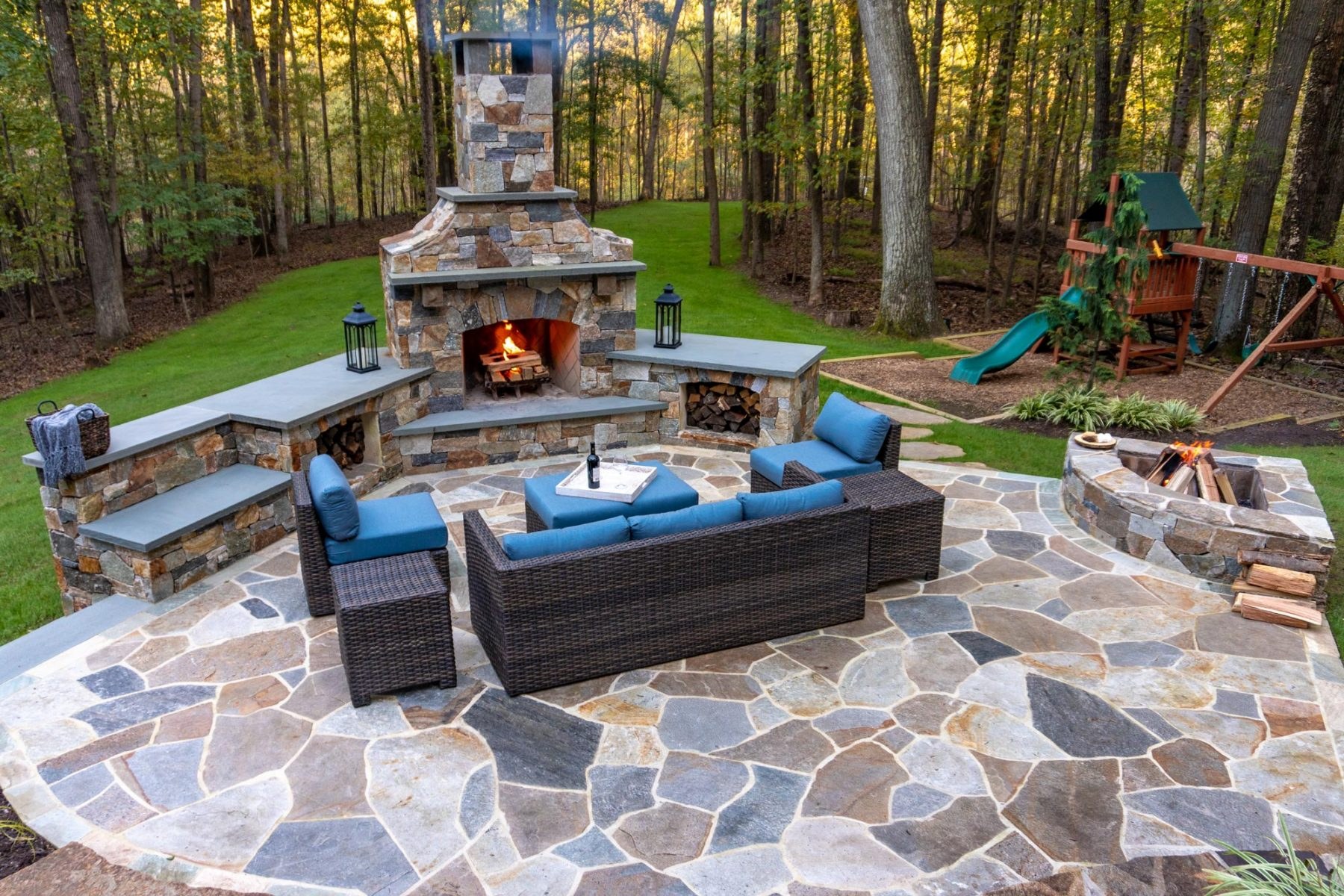 Custom flagstone patio with fire pit installed at a home in Media, PA